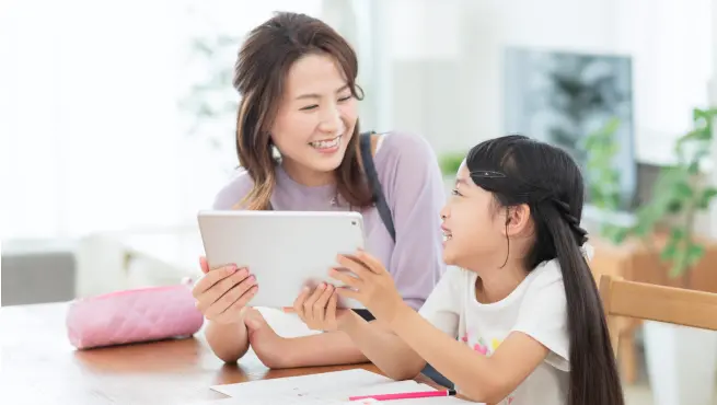 タブレットを使ってレッスン申込をする様子